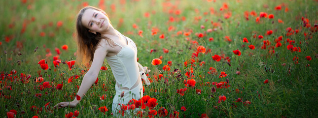 Field of Dreams: Girl Wandering Through a Poppy Paradise - 773934595