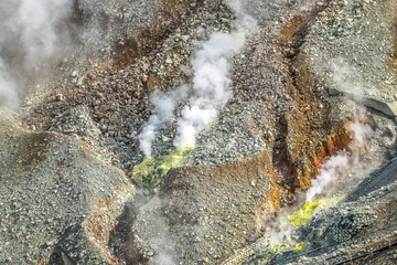 Active sulphur vents at Ōwakudani volcanic valley in Hakone, Kanagawa Prefecture, Japan. Steaming sulfur field near Mount Fuji.