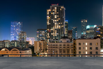 Skyscrapers Cityscape Downtown, Los Angeles Skyline Buildings. Beautiful Real Estate. Night time. Empty rooftop View. Success concept. - obrazy, fototapety, plakaty