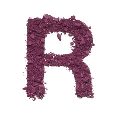 Stencil capital letter R made by burgundy crushed eye shadow or broken powder isolated on white background.