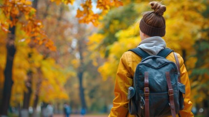 Student with backpack in park. Beautiful student girl close up. Lifestyle concept