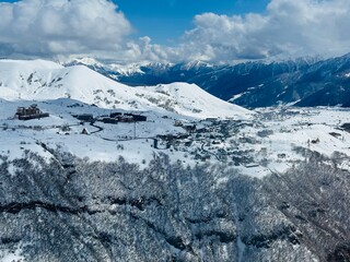 Gudauri Village Panorama With Ski Resort Background From Aerial Perspective. Aerial drone view of...