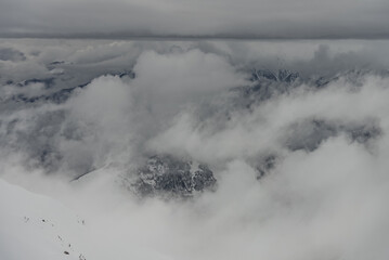 Aerial drone view of Gudauri ski resort in winter. Caucasus mountains in Georgia.  Kudebi, Bidara, Sadzele, Kobi aerial panorama in caucasus winter mountains.