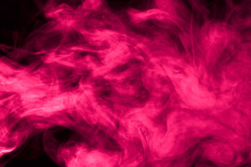 Magenta smoke on a dark black background. Beautiful c colored background.