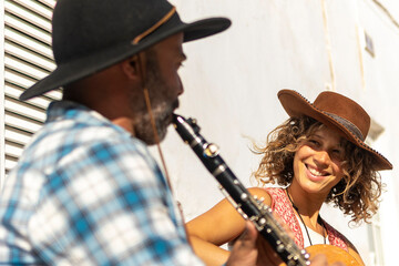 Joyful street music duo in a sunny town ambiance