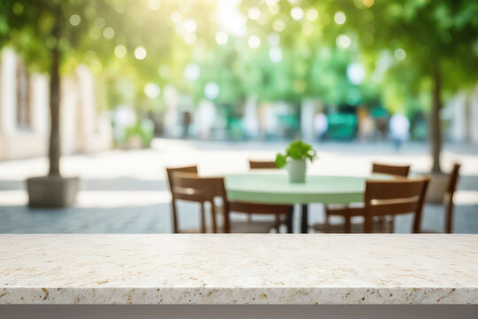 Empty stone tabletop on blurred background of a small restaurant. Layout for design.
