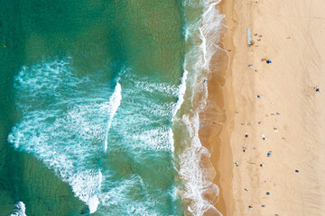 Algarve Coast in Portugal. Aerial drone view over sandy beach and Atlantic Ocean