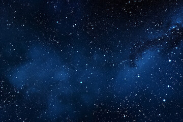 Obraz premium A night sky filled with stars shining brightly through wispy clouds