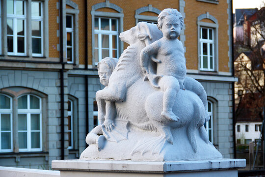 Aue-Bad Schlema, Germany - March 31, 2024: Putti with animals, sculptures on the School bridge in Aue, a former mining town in Germany in the Ore Mountains, Saxony.