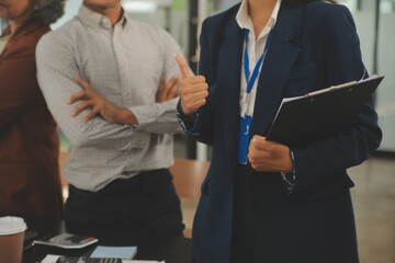 Business team meeting working with new startup project, discussion and analysis data the charts and graphs. Digital tablet, calculator, laptop computer using, Business finance and accounting concept.
