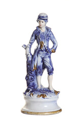 Porcelain figurine with blue painting isolated on a white background.