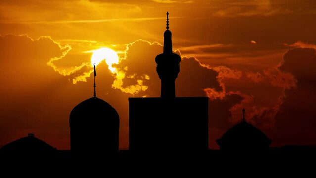 Imam Reza Shrine, Time Lapse at Sunset with Red Sun and Fiery Sky, Mashhad, Iran