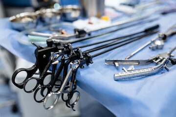 Instrument for laparoscopic surgery. Tools for surgery on the table in the operating room. Concept...