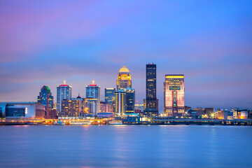 Louisville, Kentucky, USA. Cityscape image of Louisville, Kentucky, USA downtown skyline with reflection of the city the Ohio River at spring sunrise. - 774000115