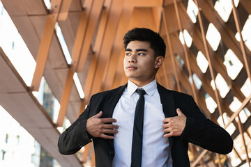 Portrait of serious businessman, lawyer or attorney with confidence outside building office. Boss,...