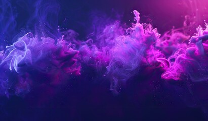 Bright pink and blue smokes on a dark background. The concept of abstract beauty and mystical atmosphere.