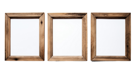 Three wooden frames rest against a bright white backdrop