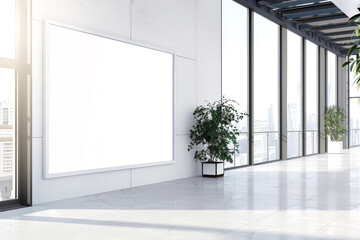 A white board is on the wall in a large room with a window