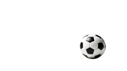 A dynamic scene captures a black and white soccer ball soaring through the air