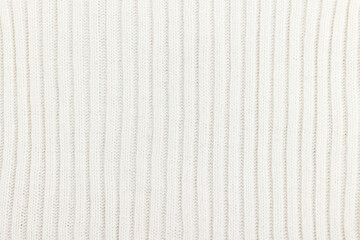 White knitted fabric with a pattern
