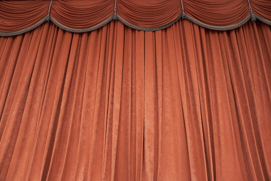 Orange Closed Curtain in Theater, Theater Performance Concept in Theater, Copy Space. High quality photo