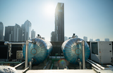 A large water tank that is an important part of a building's hot and cold water system.