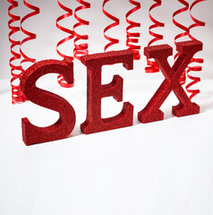 sex word with red ribbon isolated on white background - 774039549