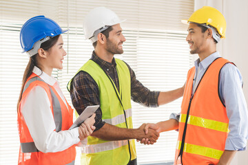 Success deal, Meeting and greeting for project of partner. Construction engineering, architect worker team or partnership hands shaking, handshake after agreement in office site, collaboration concept