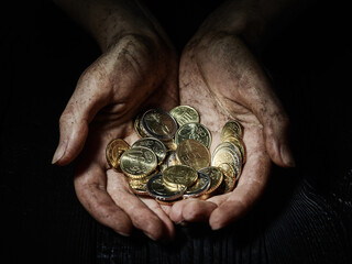 human hands holding a euro cents coins