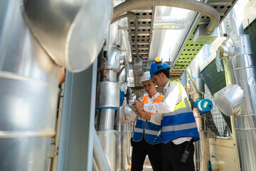 Engineers and technicians Inspect the completed air conditioning and water systems to continue...