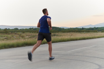 A dedicated marathon runner pushes himself to the limit in training.