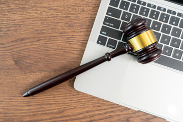 Laptop computer and judge's gavel