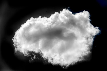White cloud on a black background. Stunning visual contrast with white cloud on black background. Unique and attractive design. Creates a feeling of calm and tranquility.