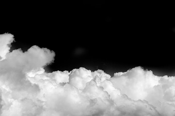 White cloud on a black background. Contrasting colors create a bold and vibrant visual effect....