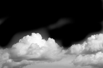 White cloud on a black background. The contrast of colors creates a striking visual effect....