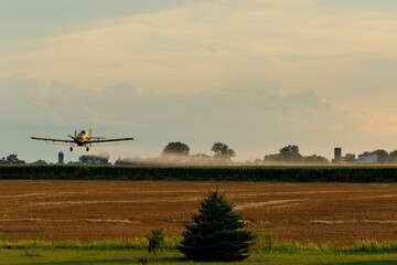 Crop duster in flight