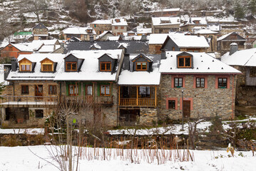 Snow-covered houses in a picturesque mountain village
