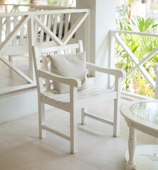  wooden chair and table at front porch