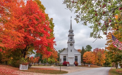 Beautiful shot of the Sandwich new Hampshire church surrounded by autumn trees - obrazy, fototapety, plakaty