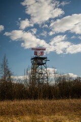 Vertical of a tower with a radar on top at Manchester Airport, United Kingdom