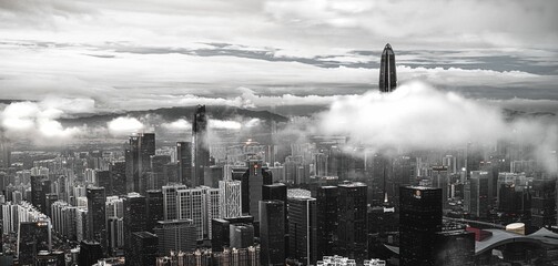 Panoramic grayscale shot of Shenzen's cityscape in fog