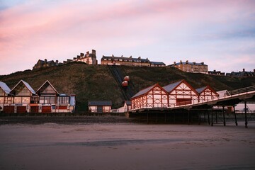 Beautiful view of the beach and the pier of Saltburn at sunset