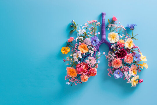 A lung is made of flowers and leaves, concept of life and vitality with copy space