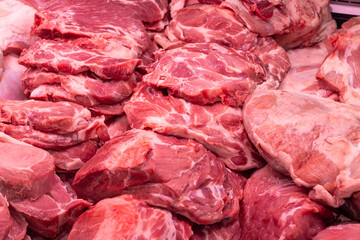 Close up of meat in a supermarket. Raw meat at butcher shop - 774097569