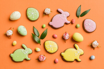 Happy Easter concept. Preparation for holiday. Easter eggs on colored background. flat lay top view copy space banner
