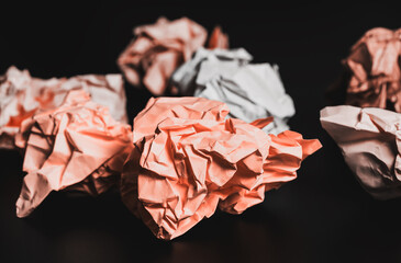 Crumpled paper of different colors. Office concept.