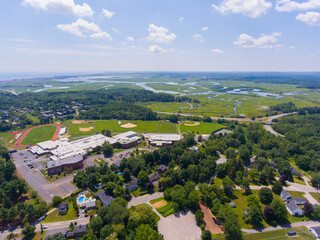 Fototapeta na wymiar Hampton historic town center aerial view including Winnacunnet High School in town of Hampton, New Hampshire NH, USA. 