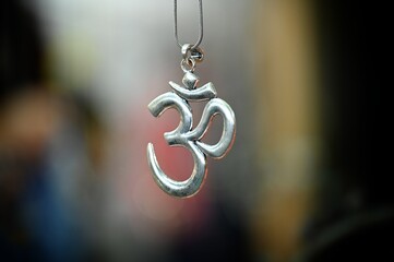 Shallow focus shot of the AUM symbol that symbolizes the Universe and the ultimate reality