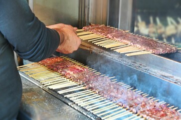 Closeup shot of the italian grilled specialty meat called arrosticini