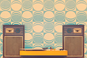 Record player with two vintage stereo speakers in front of retro seventies wallpaper